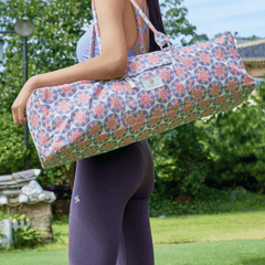 M44space- A yogi carrying a yoga bag with sturdy handles and plenty of room for a 26" yoga mat and yoga accessories. Makes a great gift M44space- A yogi carrying a yoga bag with sturdy handles and plenty of room for a 26" yoga mat and yoga accessories. Makes a great gift
